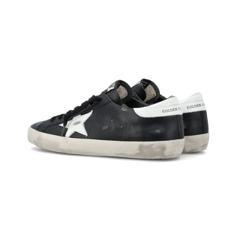 Golden Goose Super-Star glitter black with a silver star