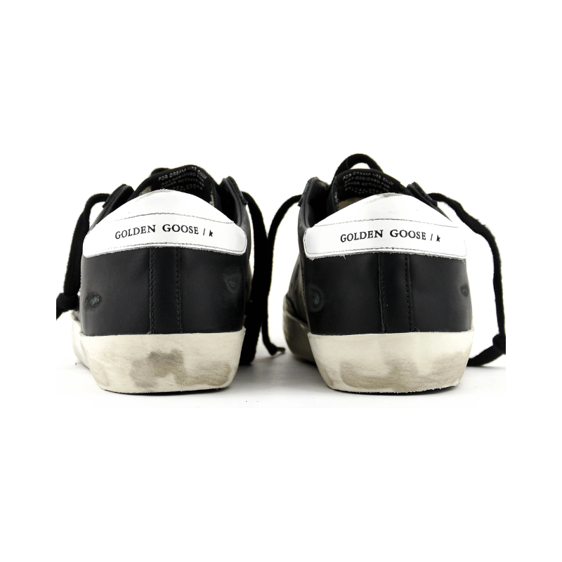 Golden Goose Super-Star glitter black with a silver star